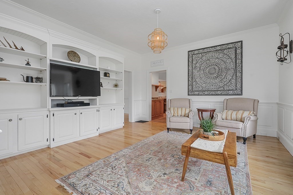 20 Maple Avenue Upton, MA 01568 - Photo 20 of 42 a living room with furniture and a flat screen tv