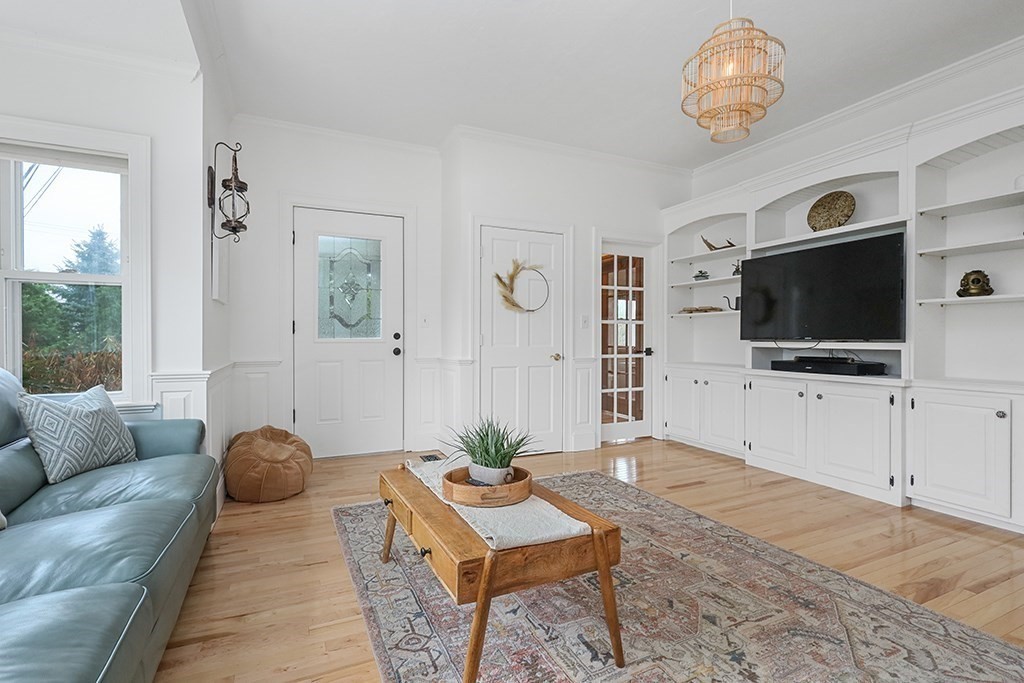 20 Maple Avenue Upton, MA 01568 - Photo 21 of 42 a living room with furniture and a flat screen tv