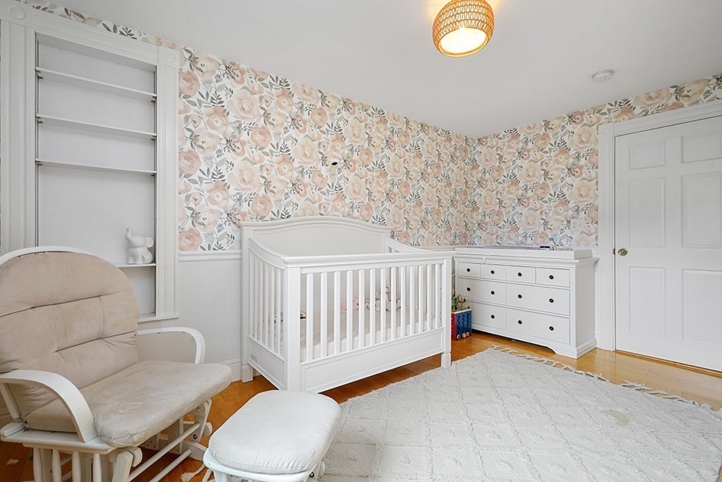 20 Maple Avenue Upton, MA 01568 - Photo 27 of 42 a bedroom with a bed and a couch