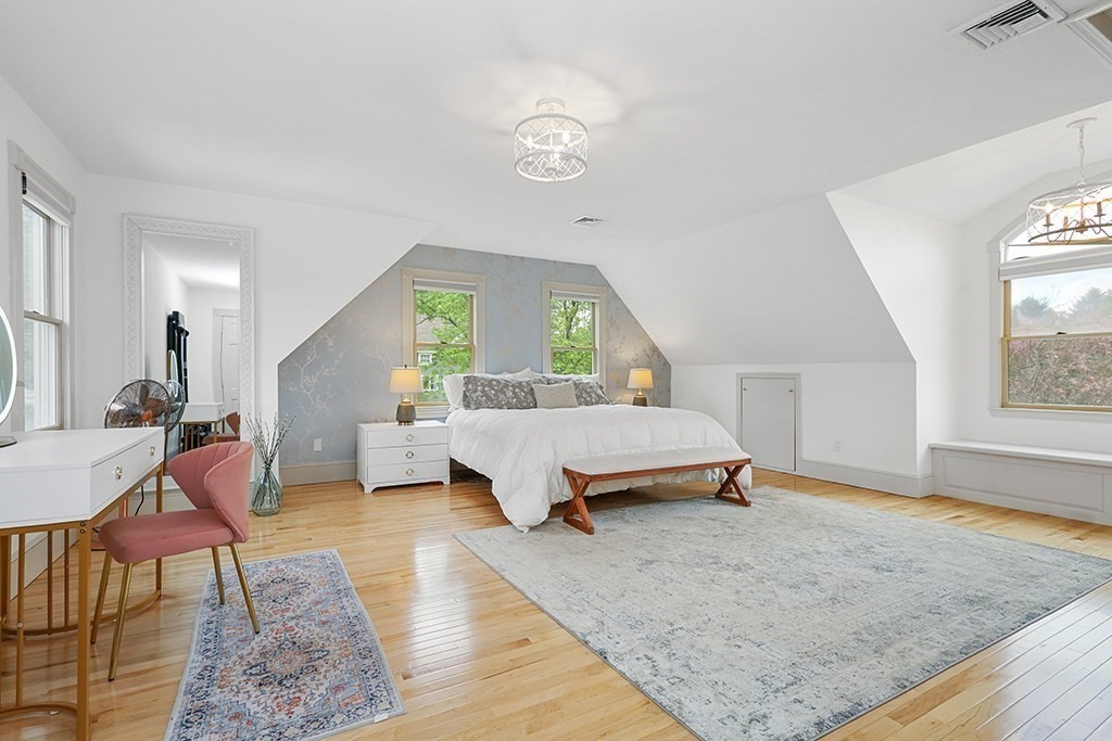 20 Maple Avenue Upton, MA 01568 - Photo 29 of 42 a bedroom with a bed a table and chair