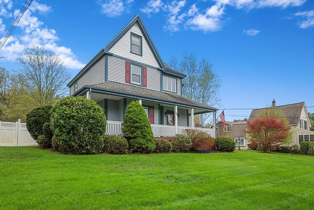 20 Maple Avenue Upton, MA 01568 - Photo 3 of 42 a front view of a house with garden