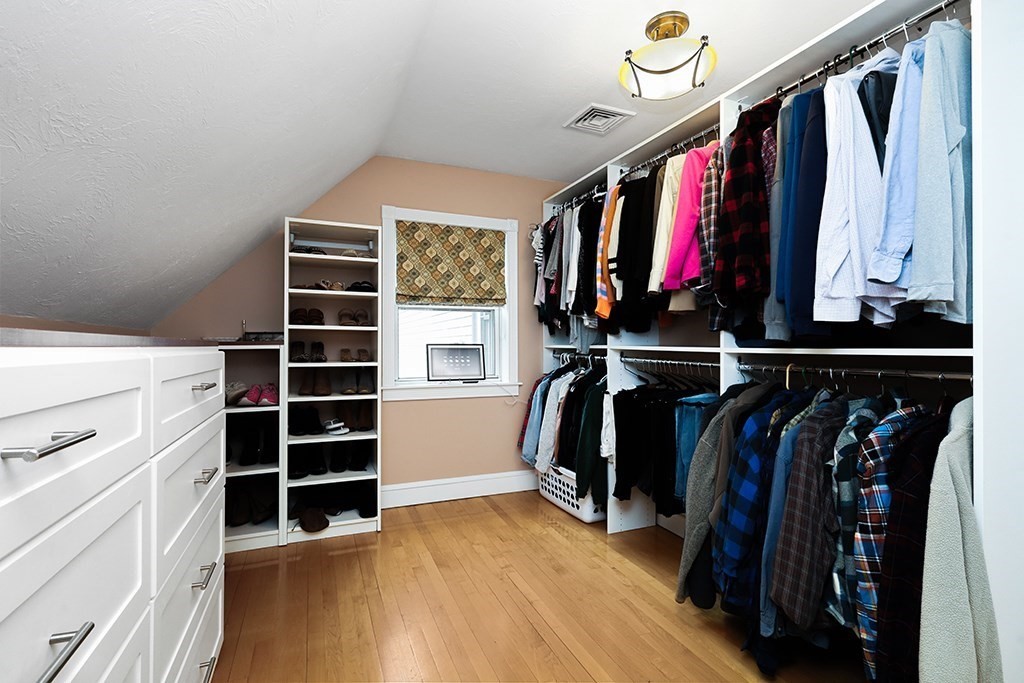 20 Maple Avenue Upton, MA 01568 - Photo 32 of 42 a view of walk in closet with clothes and shoes