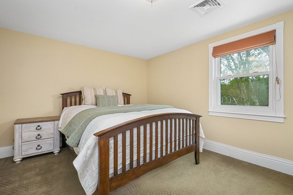 20 Maple Avenue Upton, MA 01568 - Photo 33 of 42 a bedroom with a bed and a window