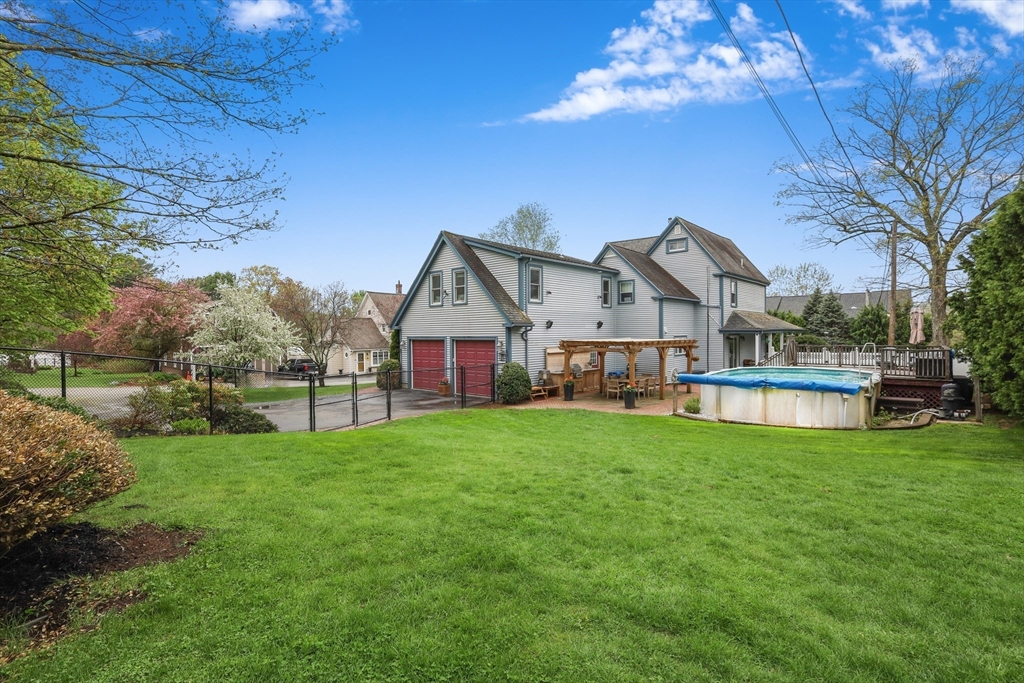 20 Maple Avenue Upton, MA 01568 - Photo 40 of 42 a view of a house with a yard and sitting area