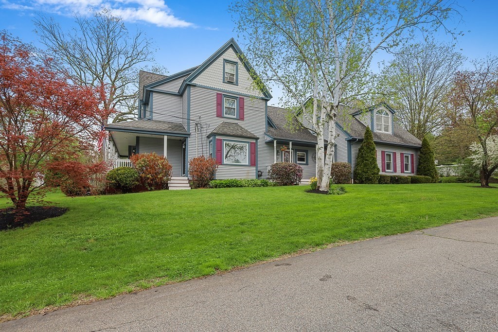 20 Maple Avenue Upton, MA 01568 - Photo 4 of 42 a front view of house with yard and green space