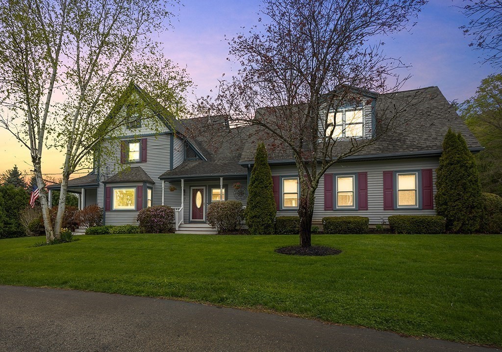 20 Maple Avenue Upton, MA 01568 - Photo 41 of 42 a front view of a house with a garden
