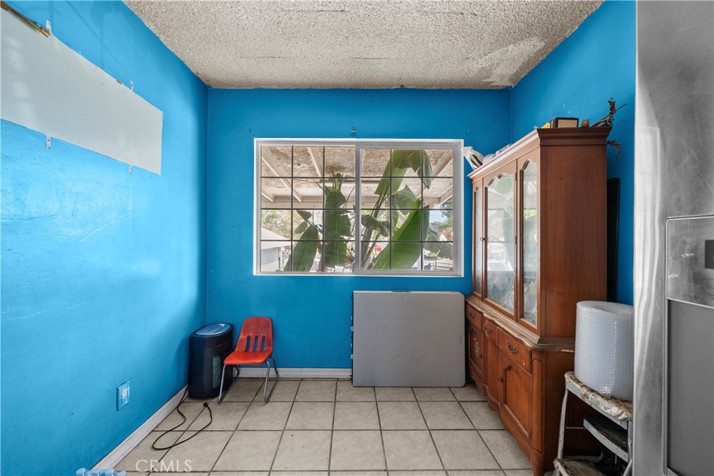 14930 Hubbard Street Sylmar, CA 91342 - Photo 14 of 22 a kitchen with a refrigerator and window