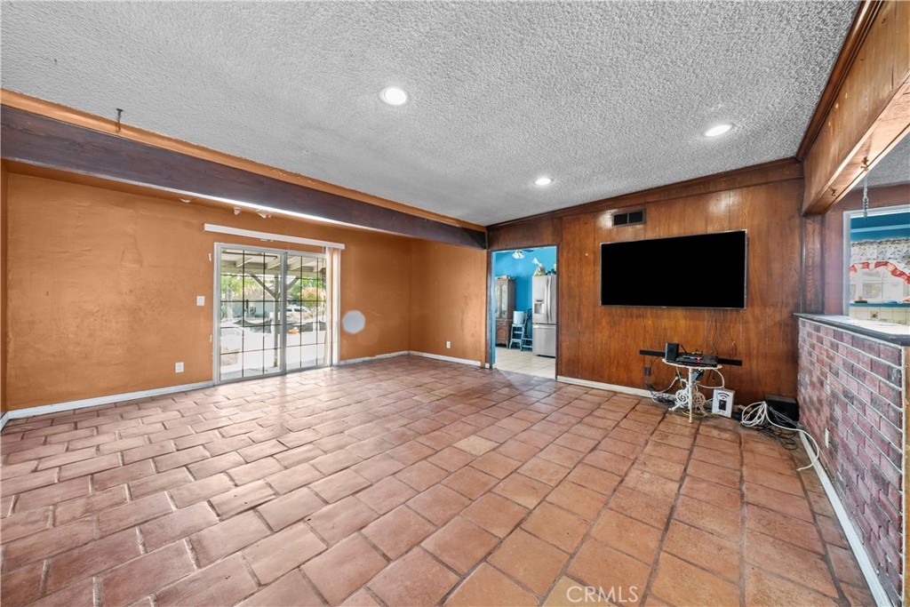 14930 Hubbard Street Sylmar, CA 91342 - Photo 6 of 22 a view of an empty room with a window