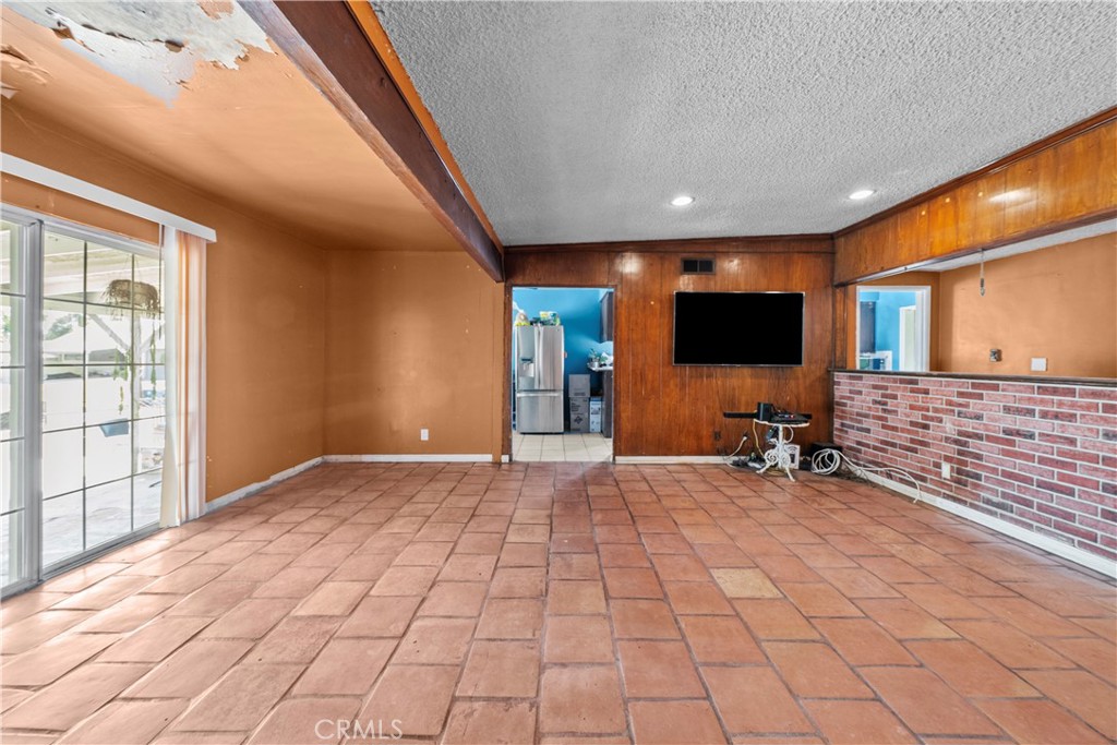 14930 Hubbard Street Sylmar, CA 91342 - Photo 7 of 22 a view of an empty room and a fireplace