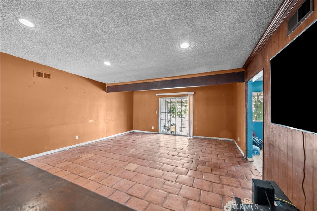 14930 Hubbard Street Sylmar, CA 91342 - Photo 9 of 22 a view of an empty room with windows