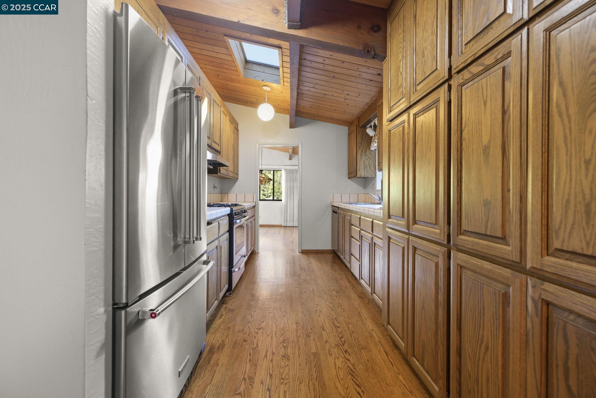 1383 Alvarado Road Berkeley, CA 94705 - Photo 14 of 47 a view of a house with wooden floor