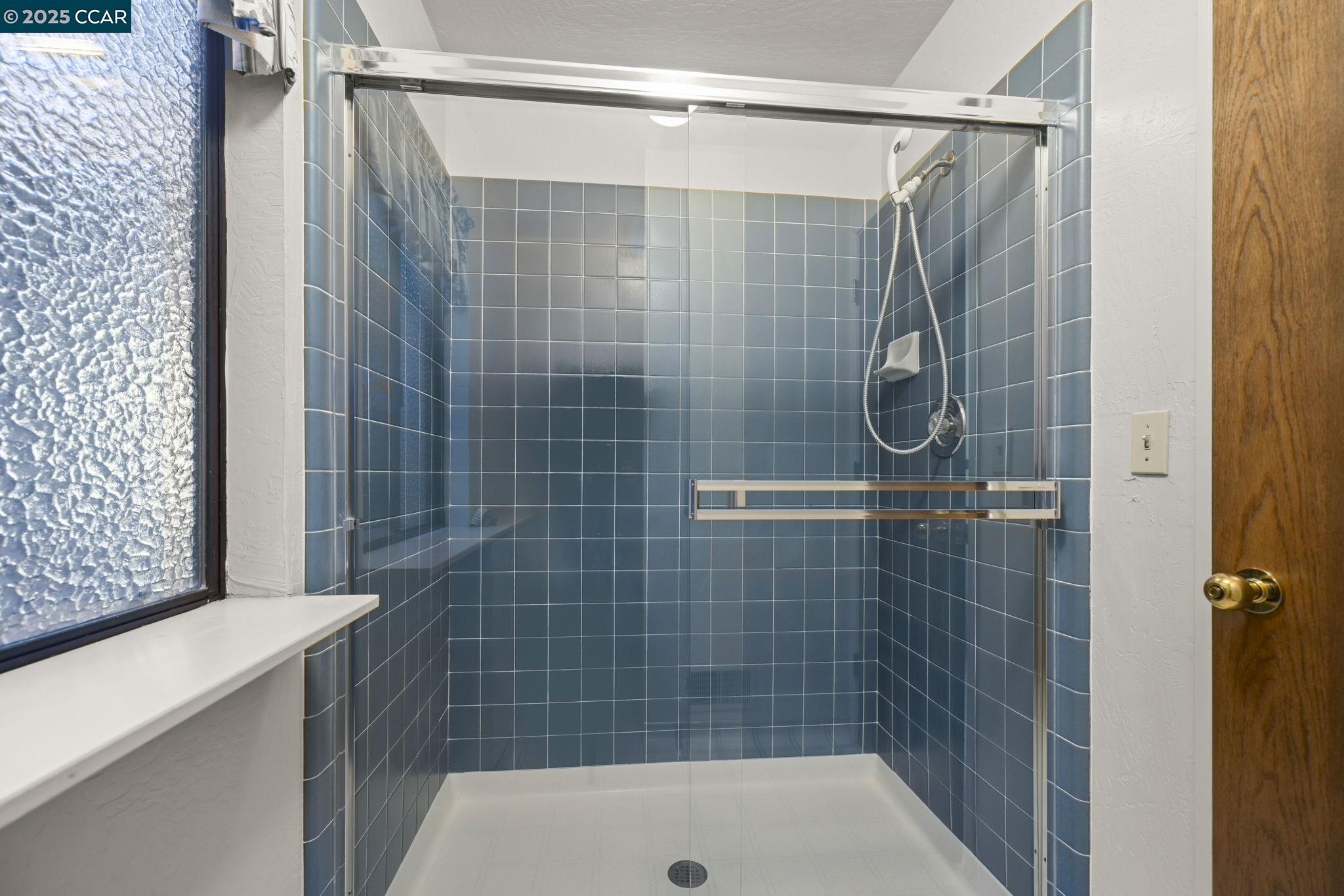 1383 Alvarado Road Berkeley, CA 94705 - Photo 22 of 47 a bathroom with a shower and a bathtub