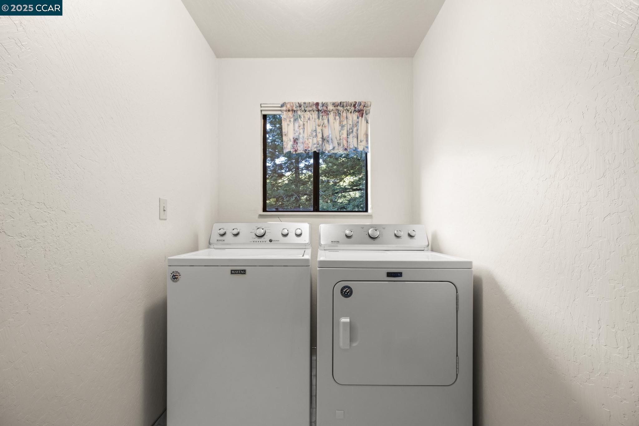 1383 Alvarado Road Berkeley, CA 94705 - Photo 25 of 47 a view of utility room with washer and dryer