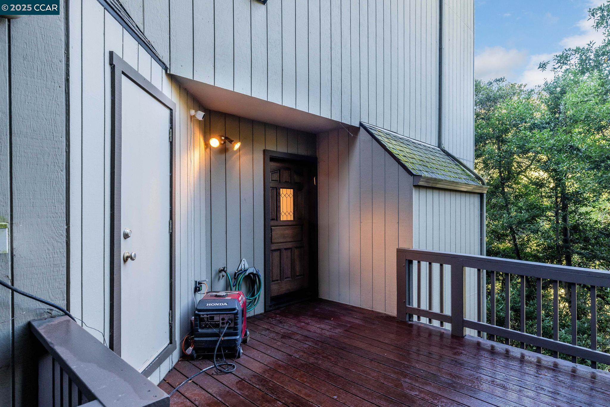 1383 Alvarado Road Berkeley, CA 94705 - Photo 31 of 47 a view of a house with a wooden bench