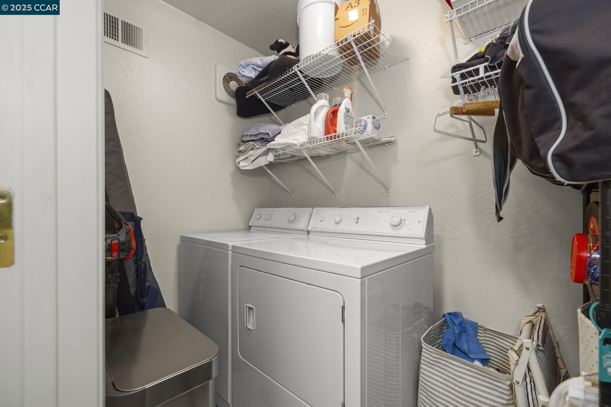 1383 Alvarado Road Berkeley, CA 94705 - Photo 35 of 47 a utility room with dryer and washer