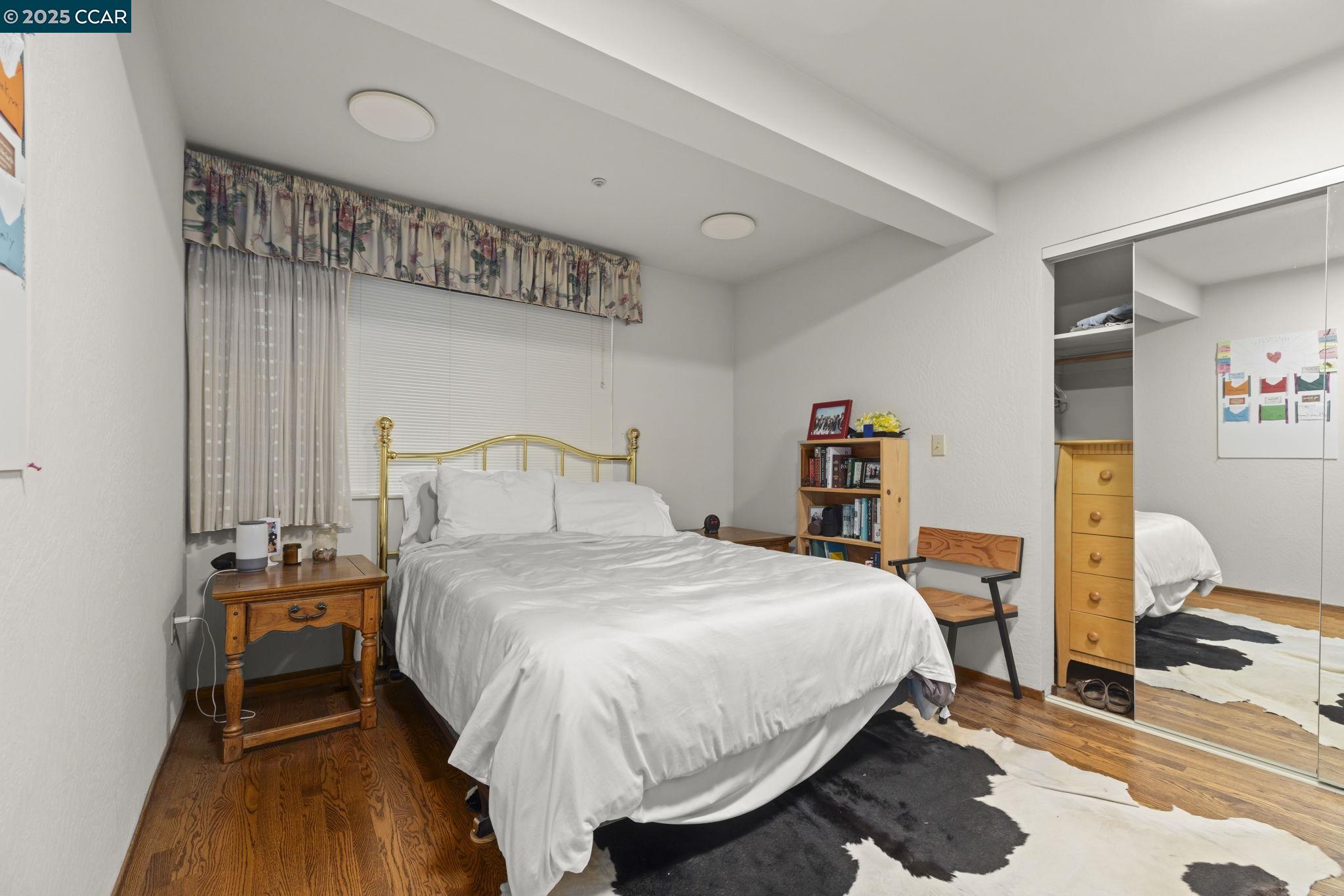 1383 Alvarado Road Berkeley, CA 94705 - Photo 36 of 47 a bedroom with a bed and a closet