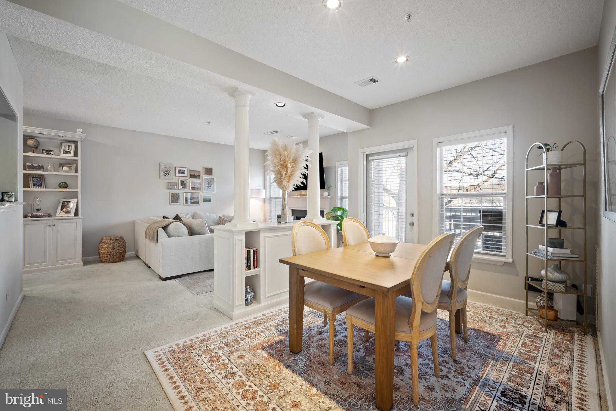 1724 Lake Shore Crest Drive, Unit 25 Reston, VA 20190 - Photo 11 of 52 a view of a dining room with furniture