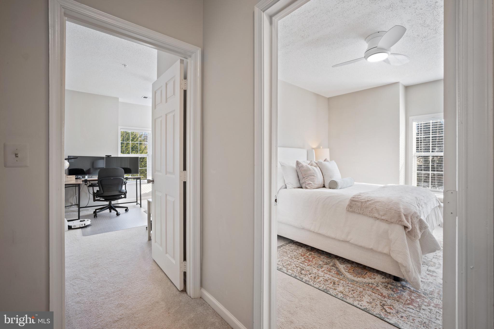 1724 Lake Shore Crest Drive, Unit 25 Reston, VA 20190 - Photo 23 of 52 a room that has a bed and a chair in it