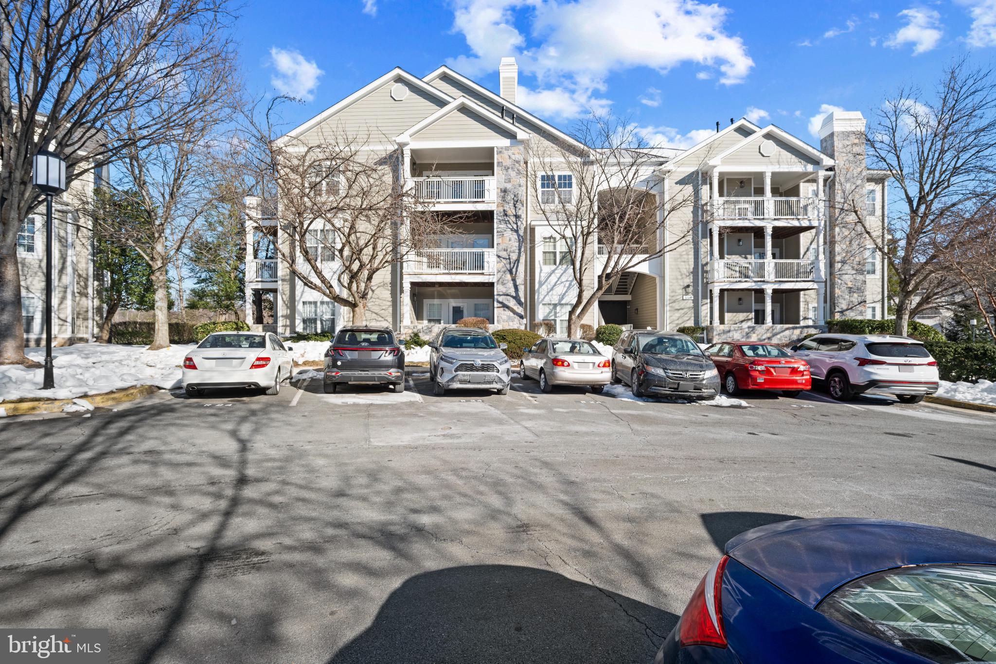 1724 Lake Shore Crest Drive, Unit 25 Reston, VA 20190 - Photo 30 of 52 a view of a street with cars