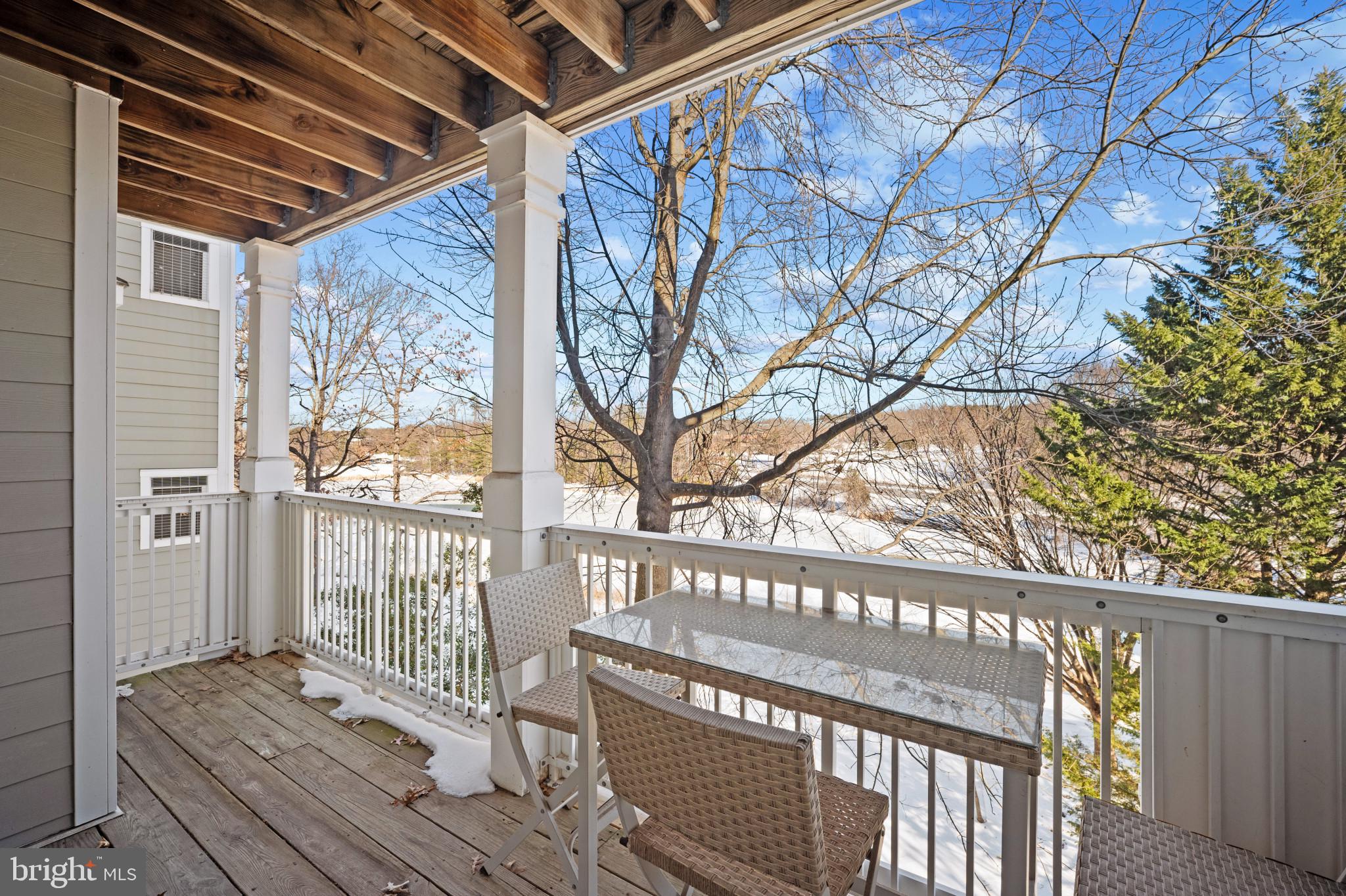 1724 Lake Shore Crest Drive, Unit 25 Reston, VA 20190 - Photo 33 of 52 a view of a wooden balcony with outdoor space