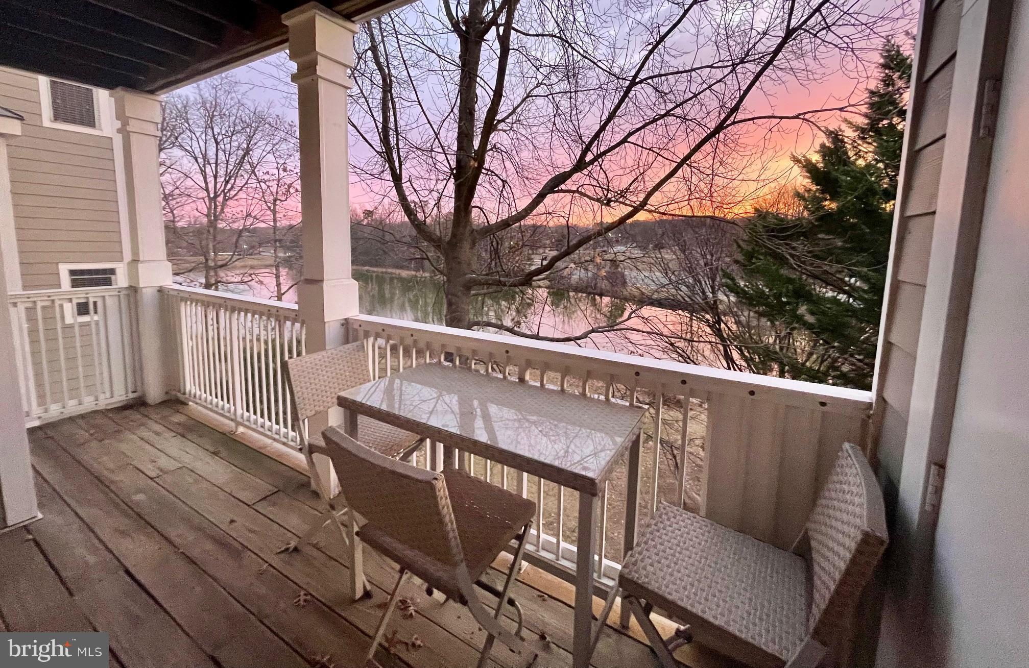 1724 Lake Shore Crest Drive, Unit 25 Reston, VA 20190 - Photo 34 of 52 a view of balcony with wooden floor and outdoor seating