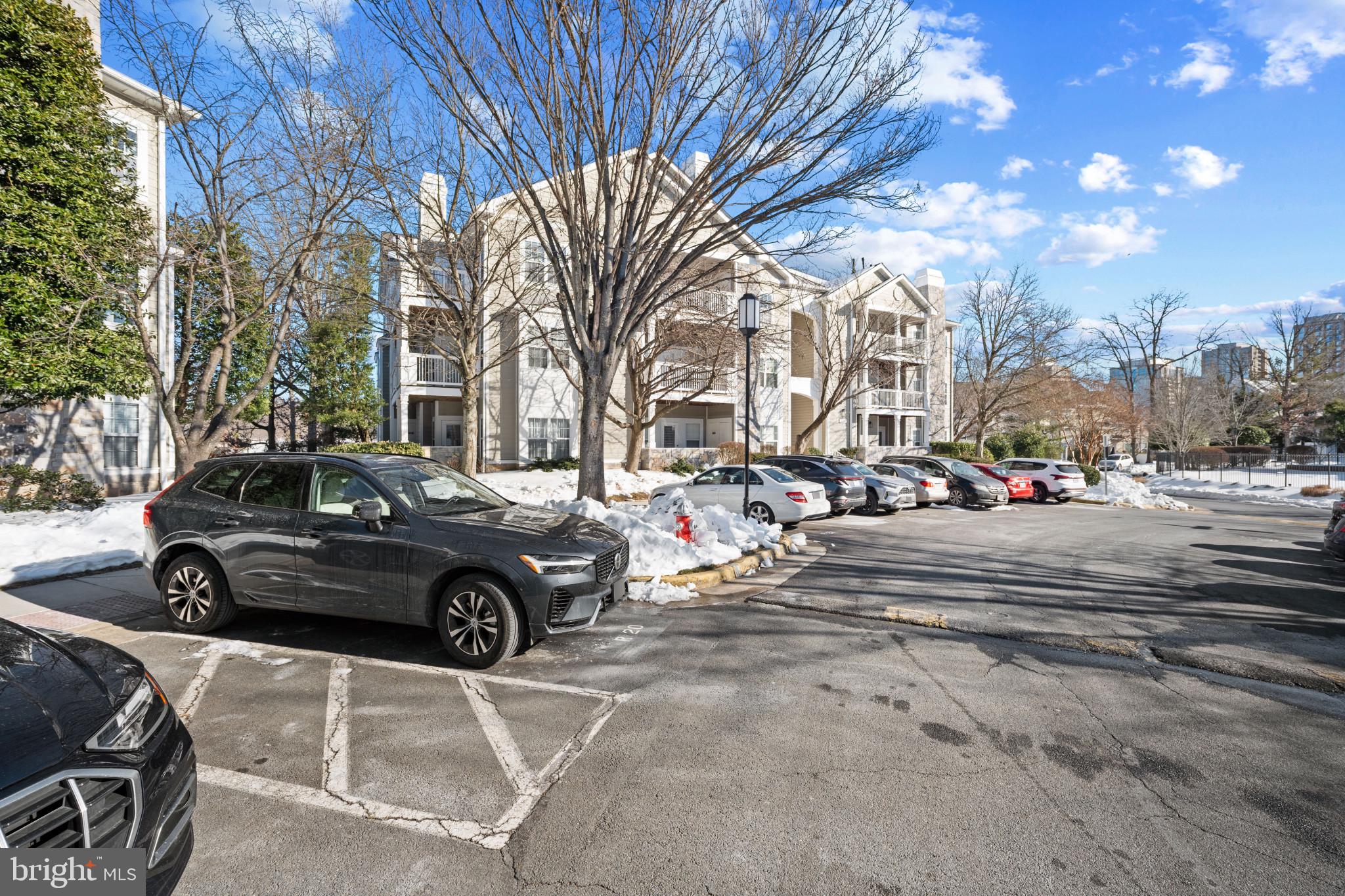 1724 Lake Shore Crest Drive, Unit 25 Reston, VA 20190 - Photo 46 of 52 a view of parking with cars
