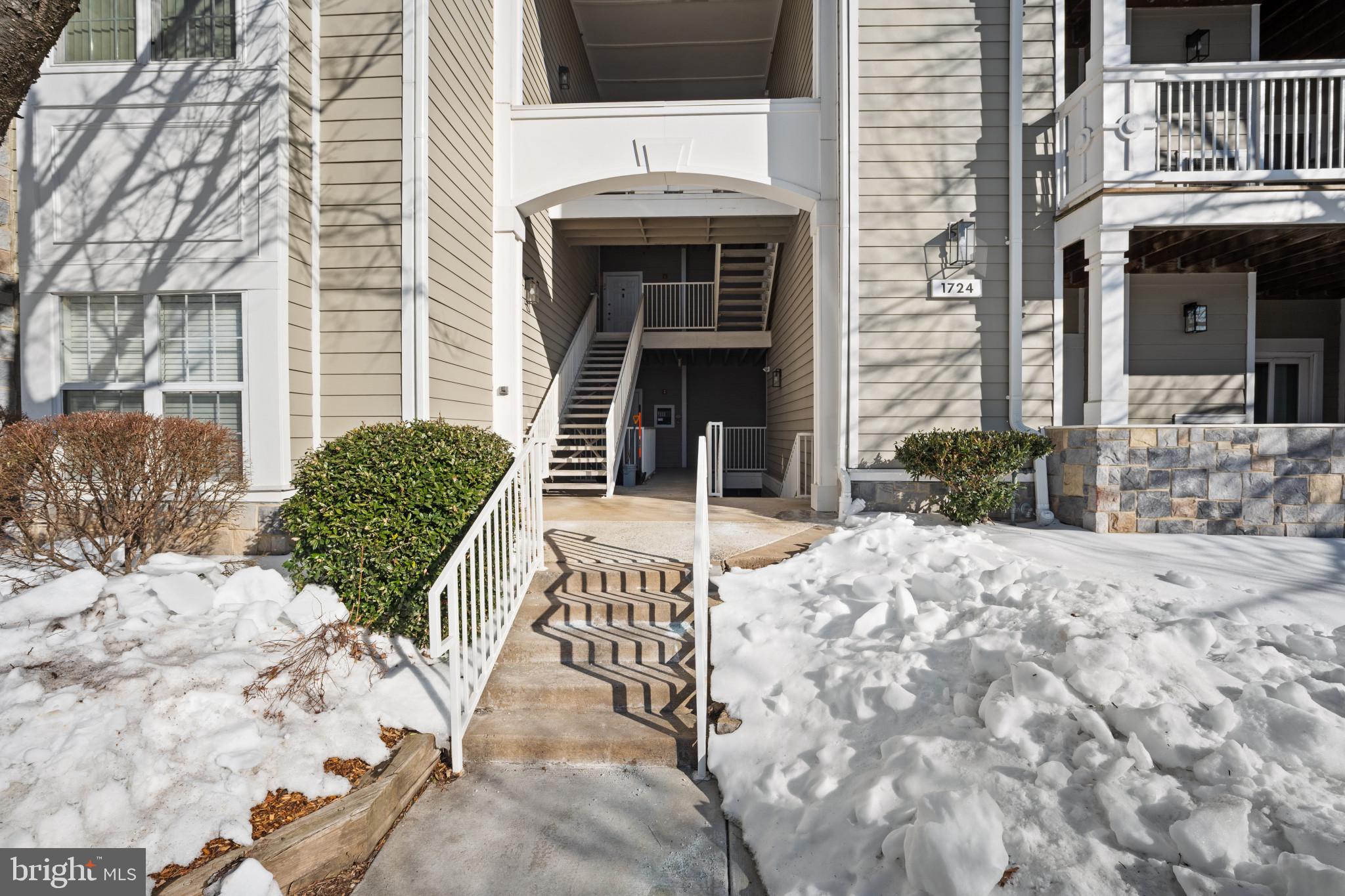 1724 Lake Shore Crest Drive, Unit 25 Reston, VA 20190 - Photo 47 of 52 a view of a entryway door front of house