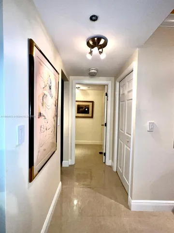 a kitchen with granite countertop a sink and a stove