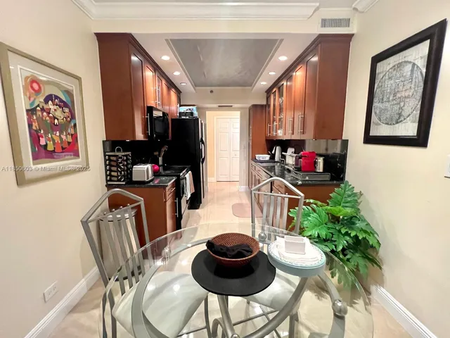 a bedroom with a bed and a lamp