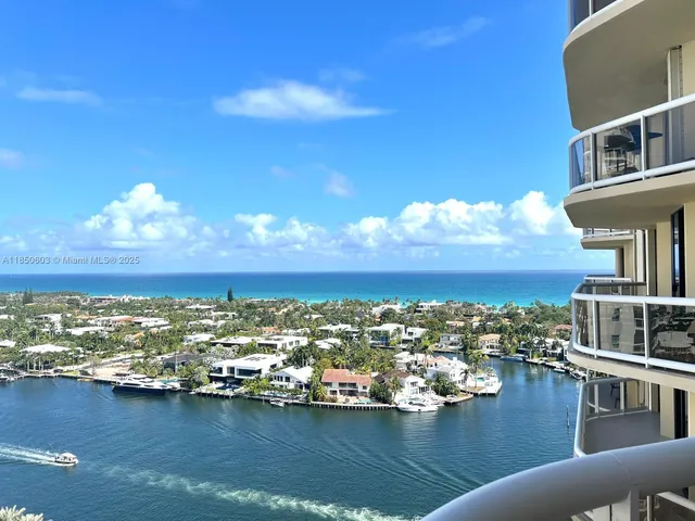 a view of a lake with houses