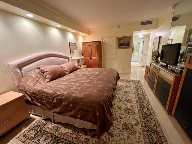 a view of bedroom and bathroom