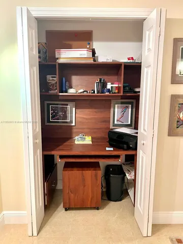 a bathroom with a double vanity sink mirror and shower
