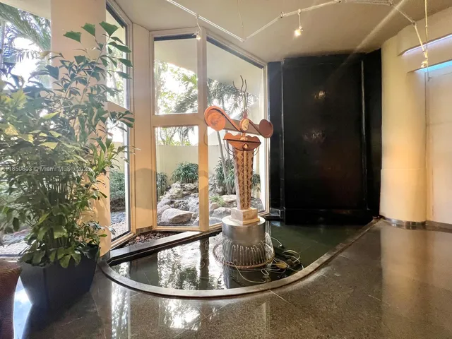 a view of a hallway with an empty room