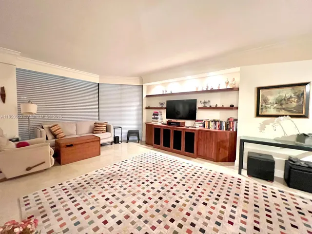 a living room with furniture or couch and a window