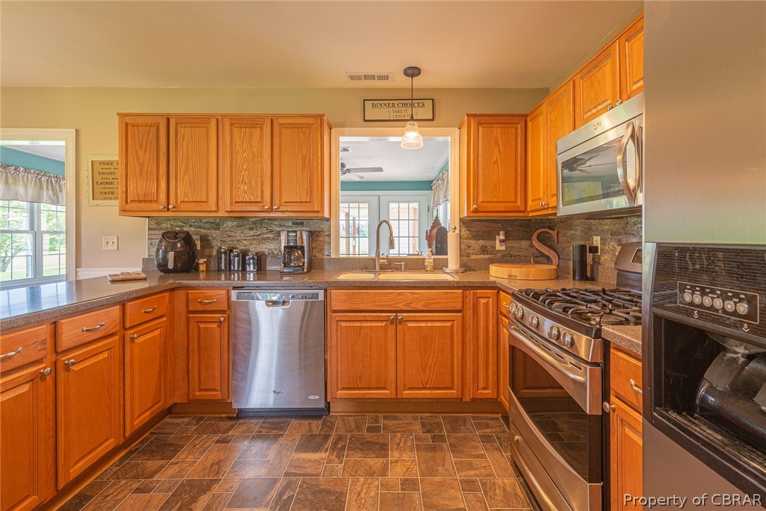 3861 Irvington Road Irvington, VA 22480 - Photo 15 of 30 Very workable kitchen, with pantry.
