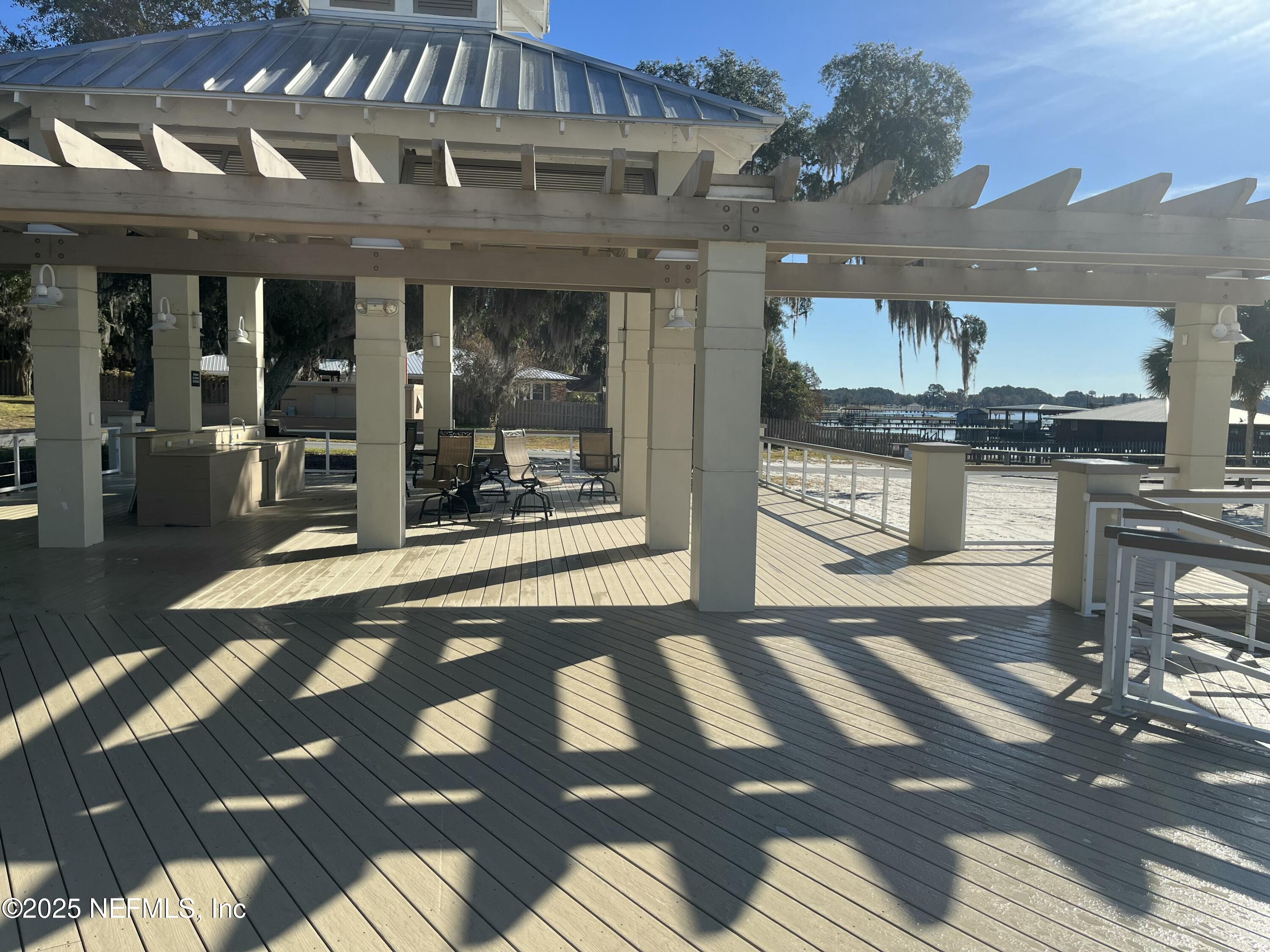 6486 Cabana Trace Starke, FL 32091 - Photo 11 of 16 a view of a building with wooden floor