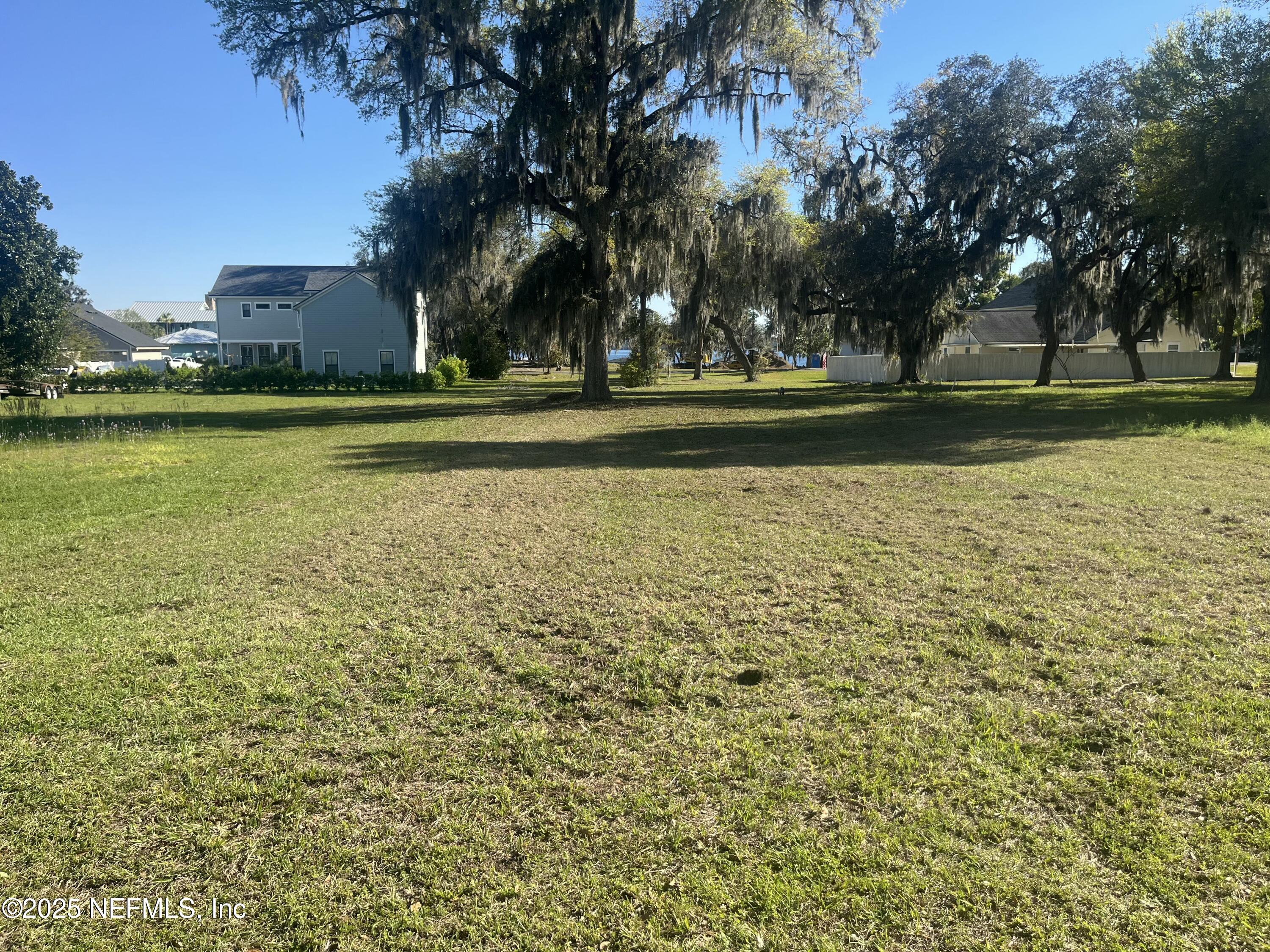 6486 Cabana Trace Starke, FL 32091 - Photo 5 of 16 a view of building with river and trees