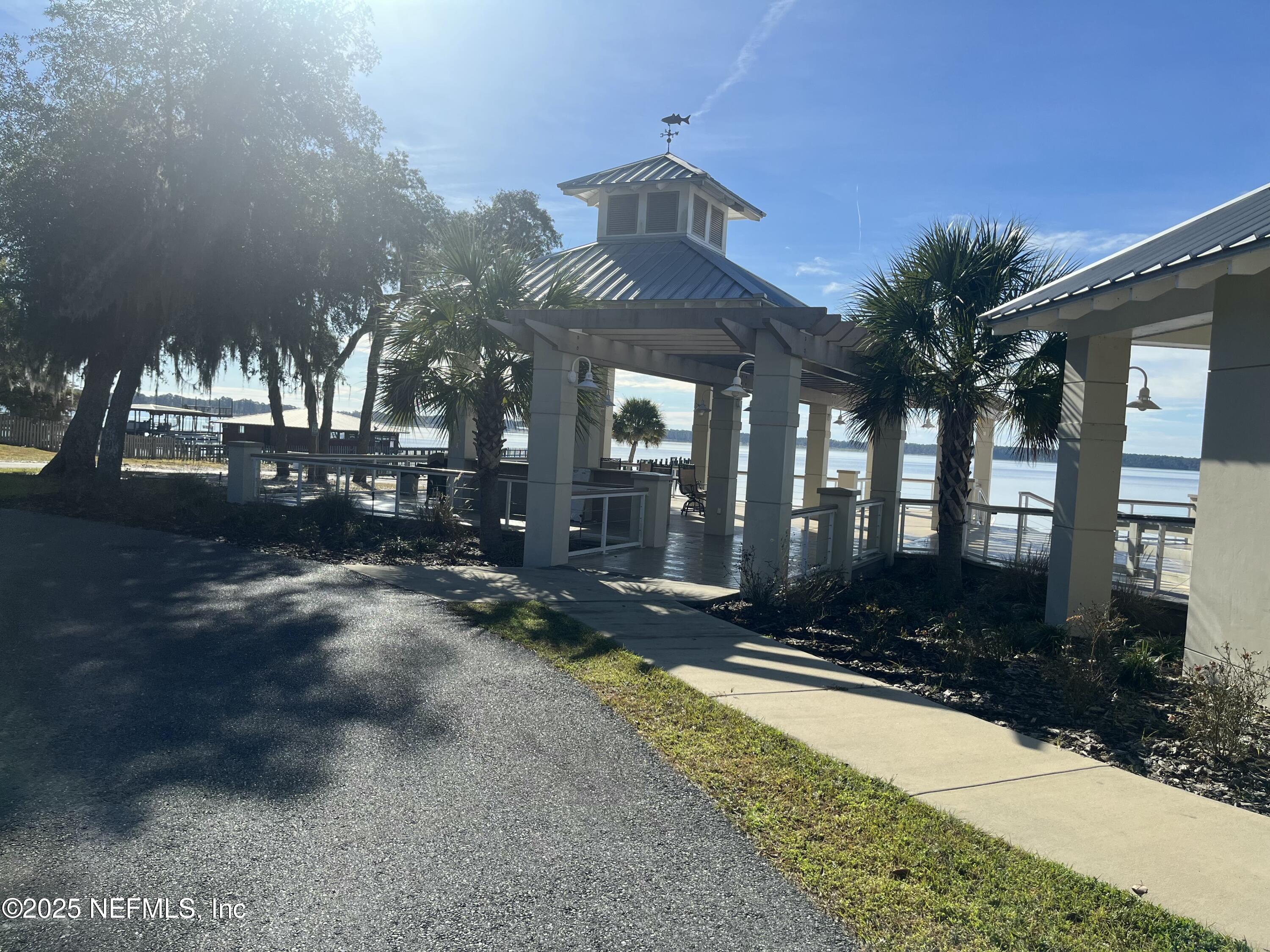 6486 Cabana Trace Starke, FL 32091 - Photo 9 of 16 a front view of a house with a yard