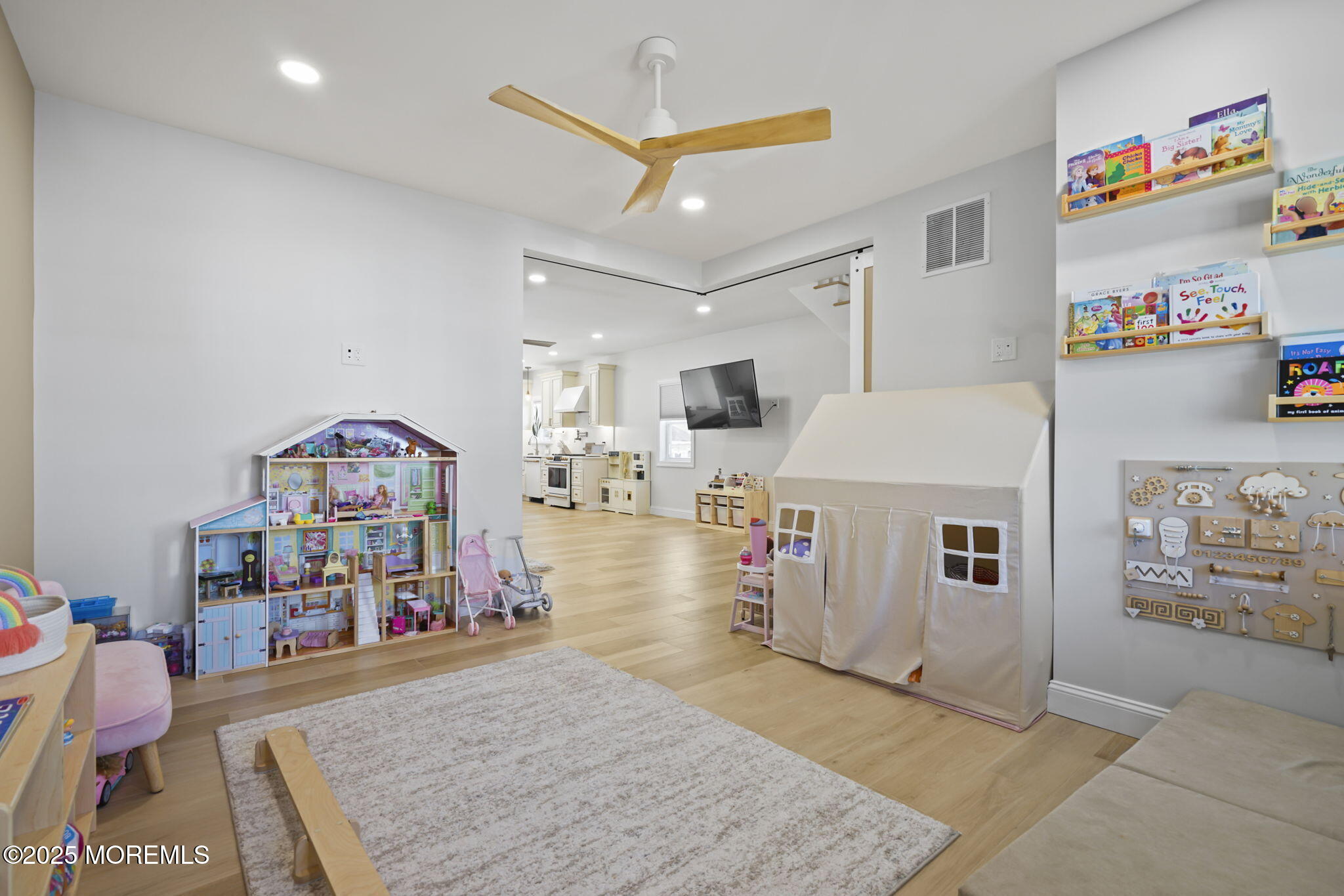 128 1st Street Keyport, NJ 07735 - Photo 12 of 38 a living room with furniture and a wooden floor