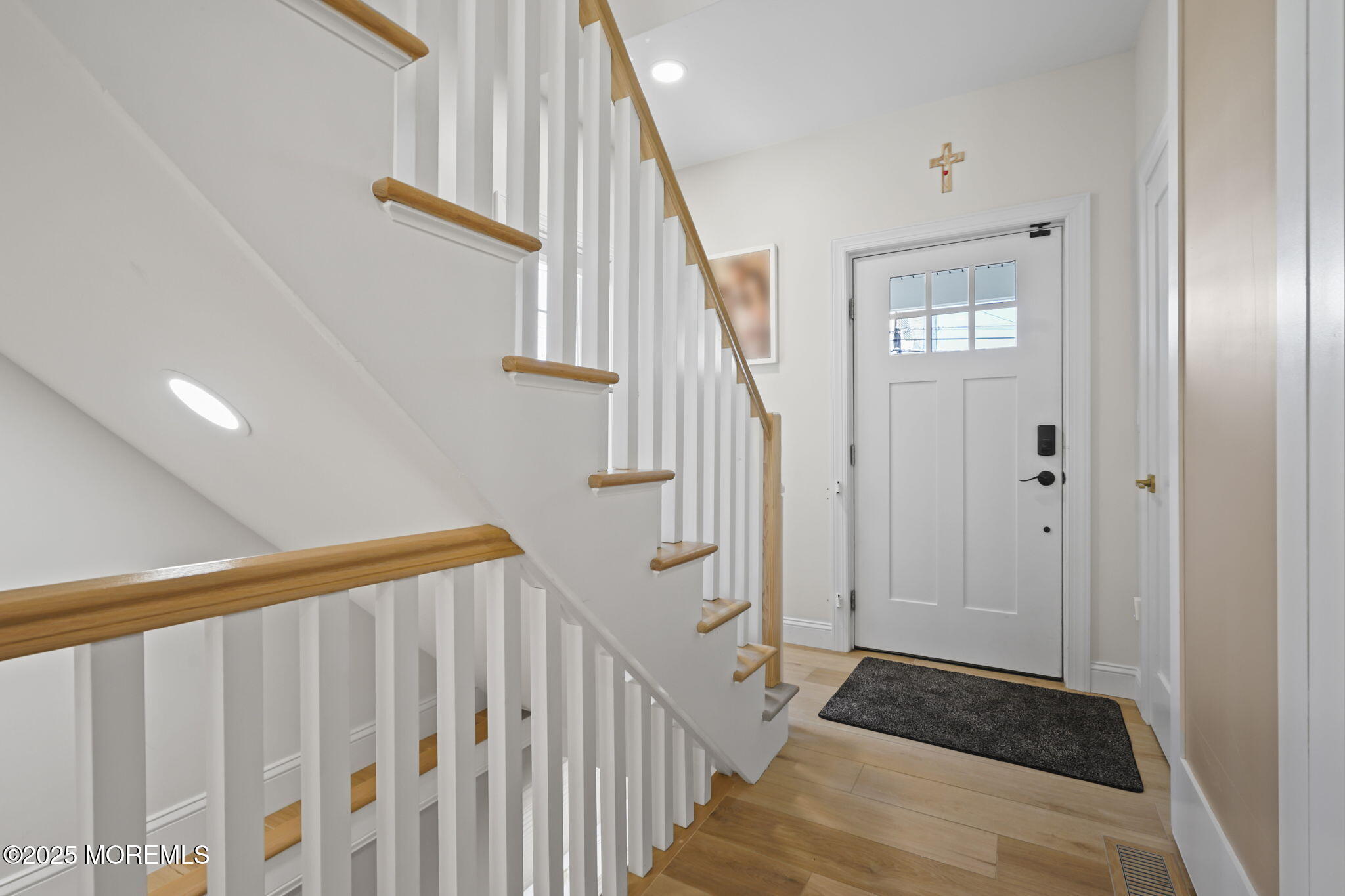 128 1st Street Keyport, NJ 07735 - Photo 15 of 38 a view of a hallway with wooden floor and entryway