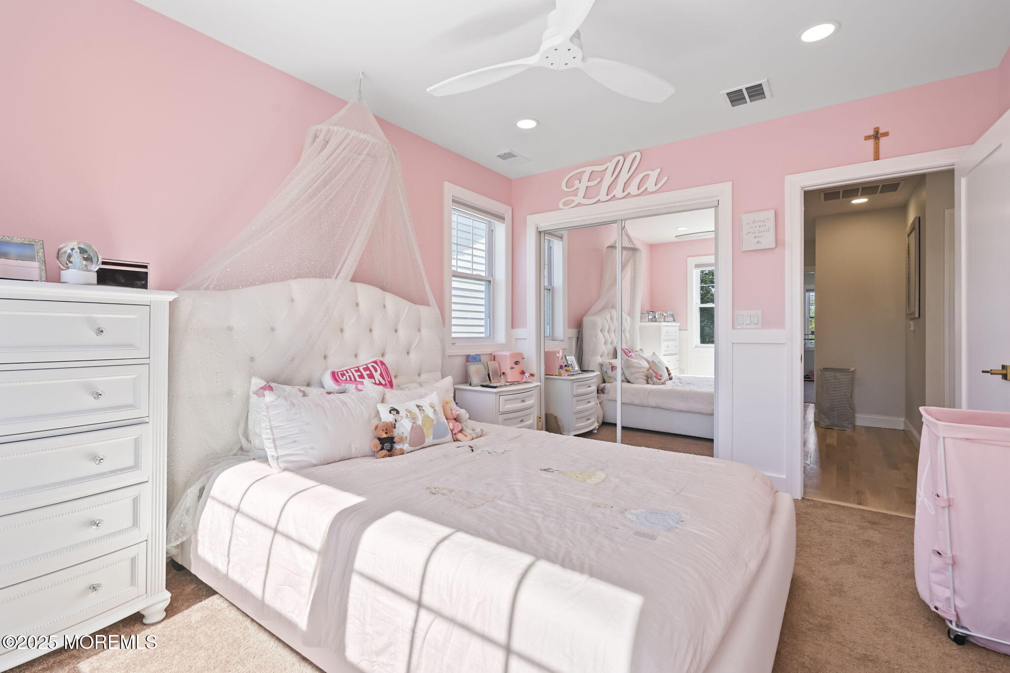 128 1st Street Keyport, NJ 07735 - Photo 16 of 38 a bedroom with a large bed and wooden floor