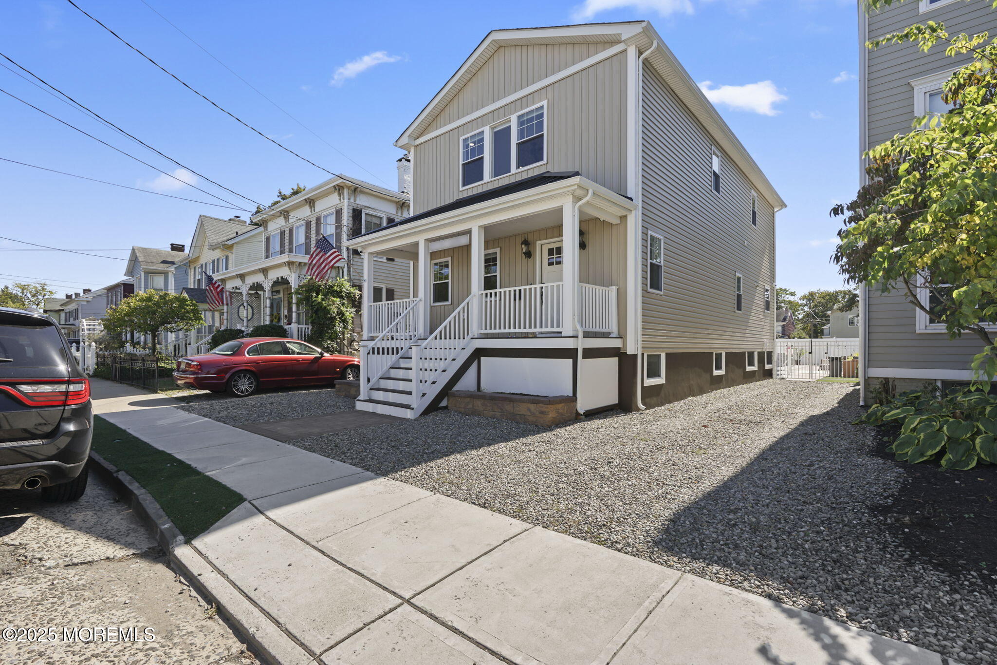 128 1st Street Keyport, NJ 07735 - Photo 2 of 38 a front view of a house with a yard