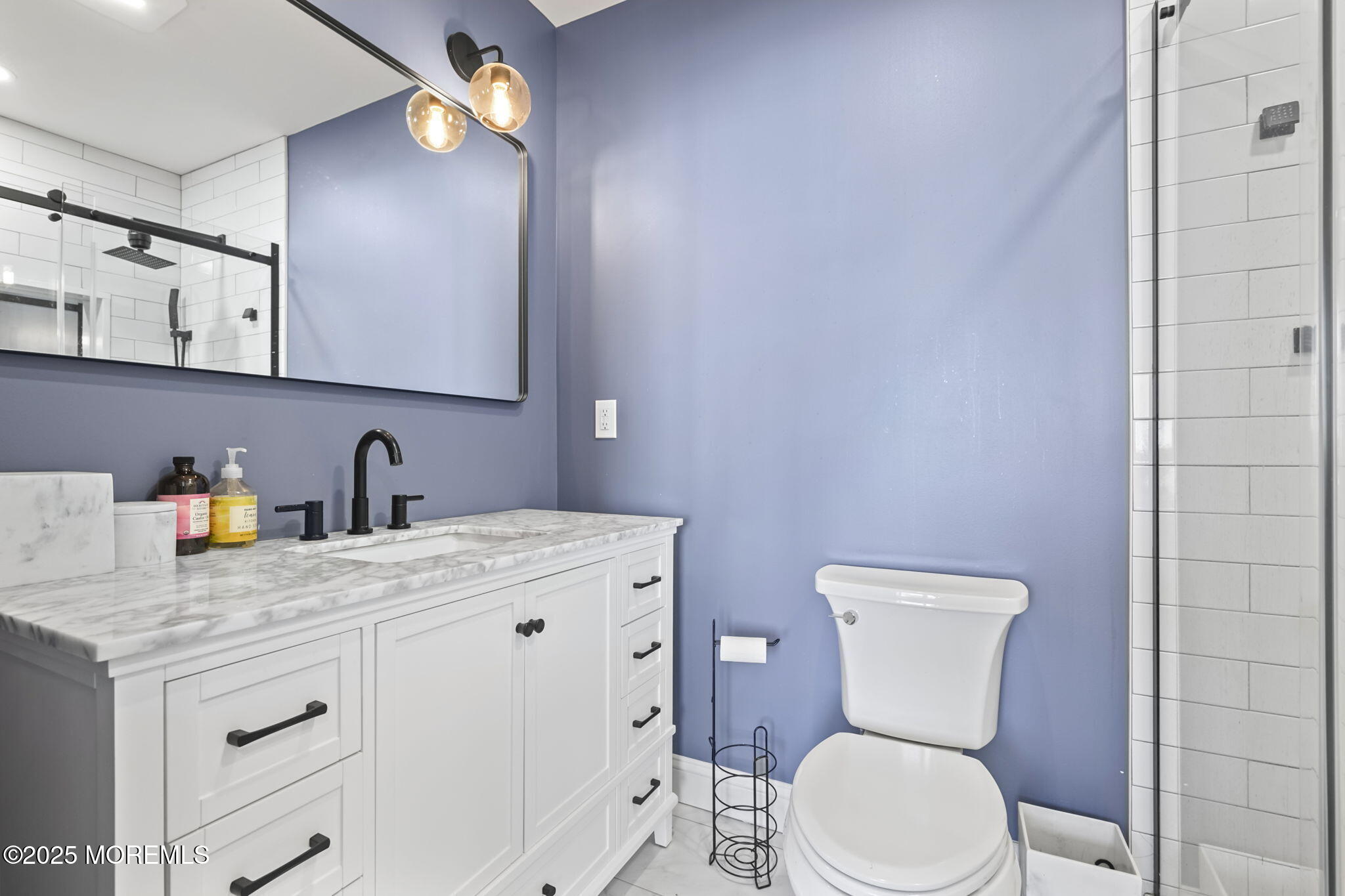 128 1st Street Keyport, NJ 07735 - Photo 22 of 38 a bathroom with a granite countertop toilet sink and mirror