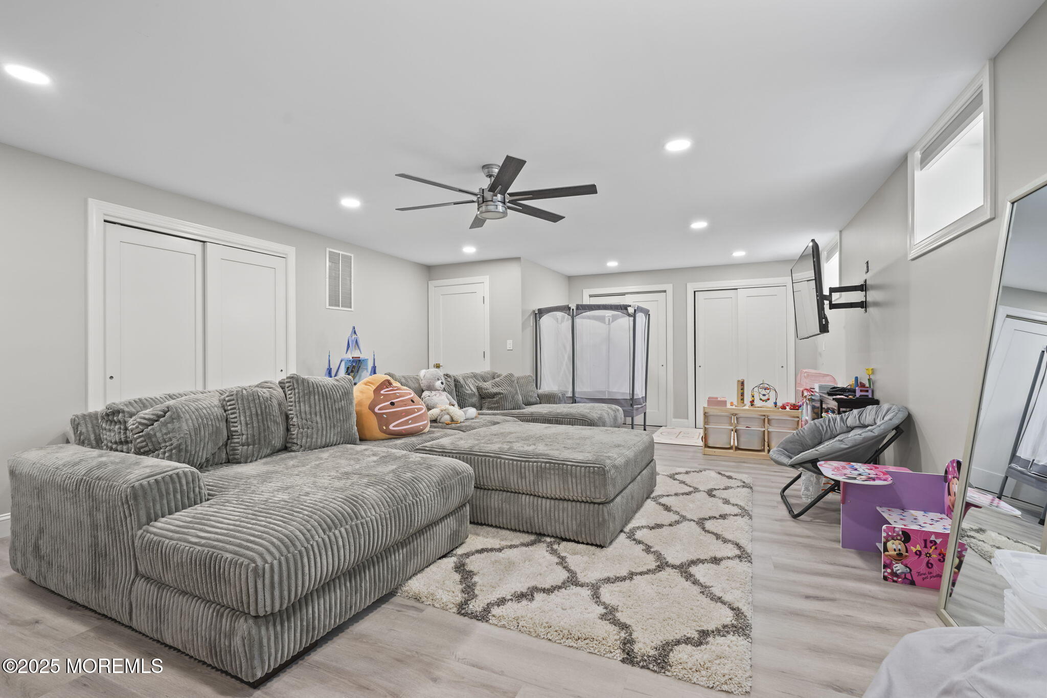 128 1st Street Keyport, NJ 07735 - Photo 26 of 38 a living room with furniture and a ceiling fan