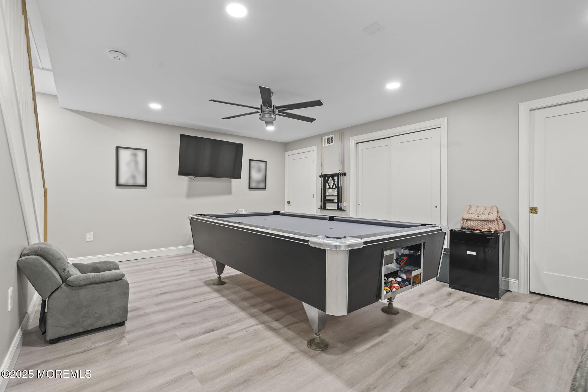 128 1st Street Keyport, NJ 07735 - Photo 27 of 38 a living room with stainless steel appliances kitchen island hardwood floor and a couch