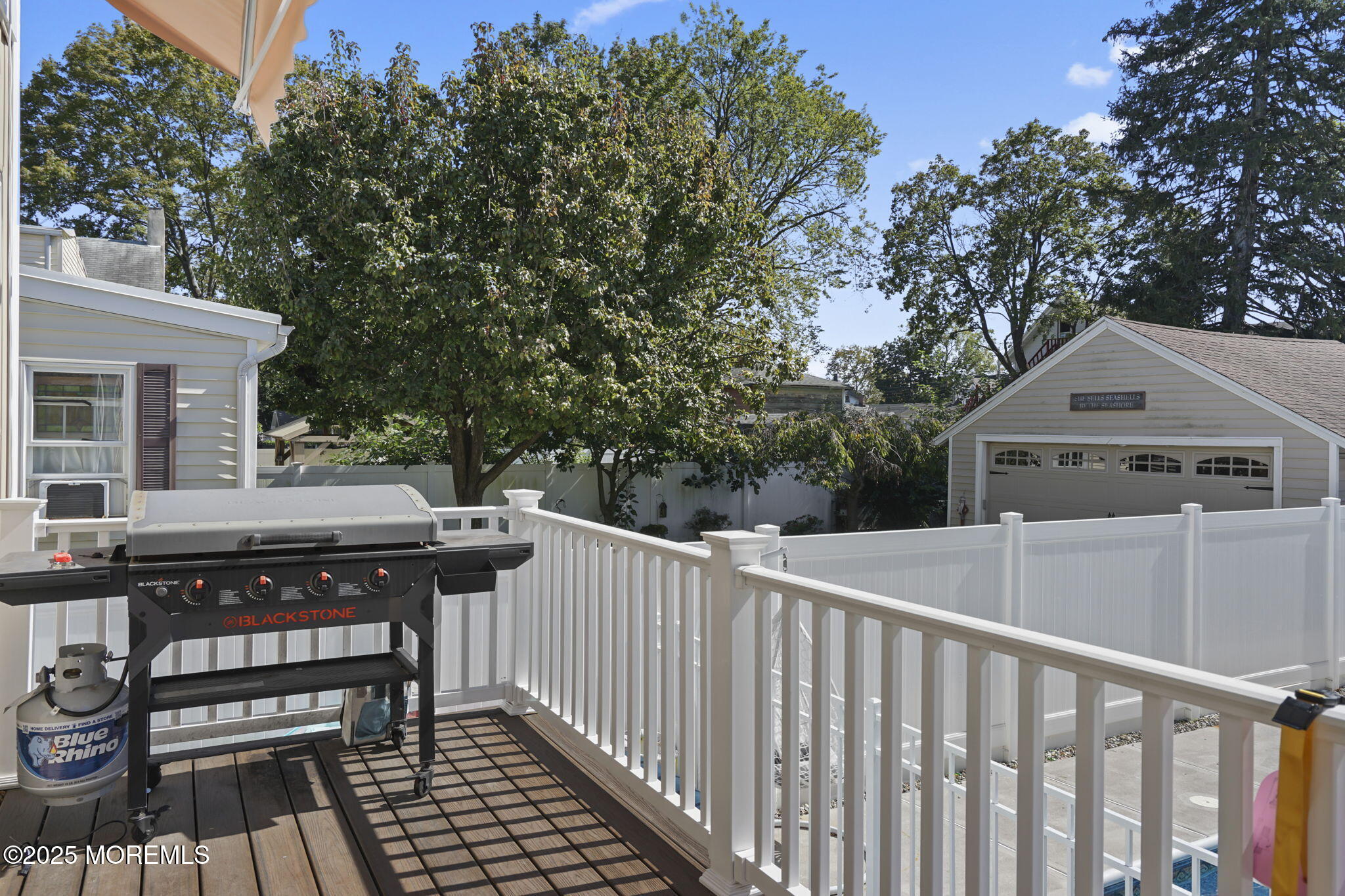 128 1st Street Keyport, NJ 07735 - Photo 32 of 38 a view of a roof deck with wooden fence and floor
