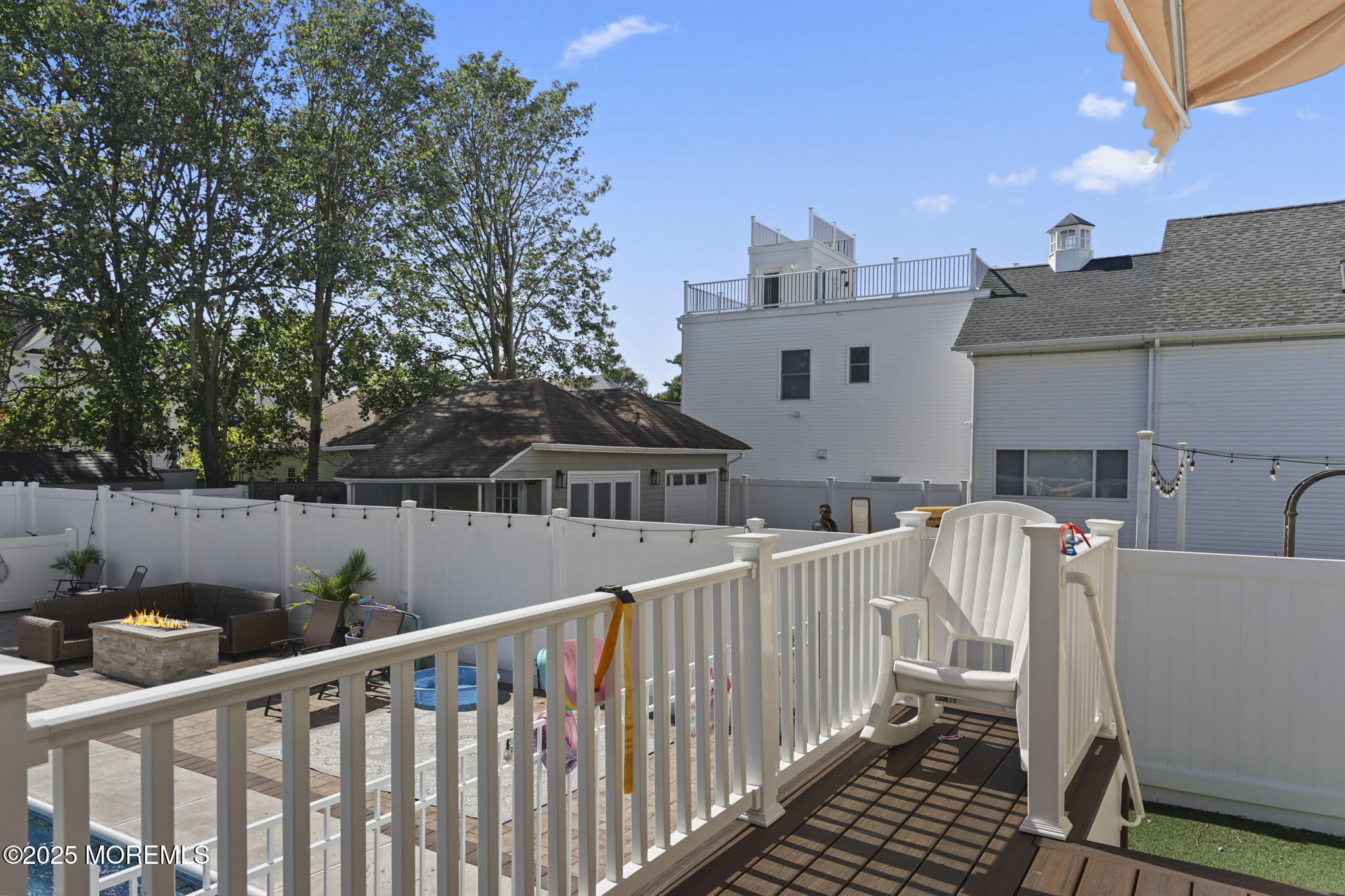 128 1st Street Keyport, NJ 07735 - Photo 34 of 38 a view of a house with wooden deck and furniture
