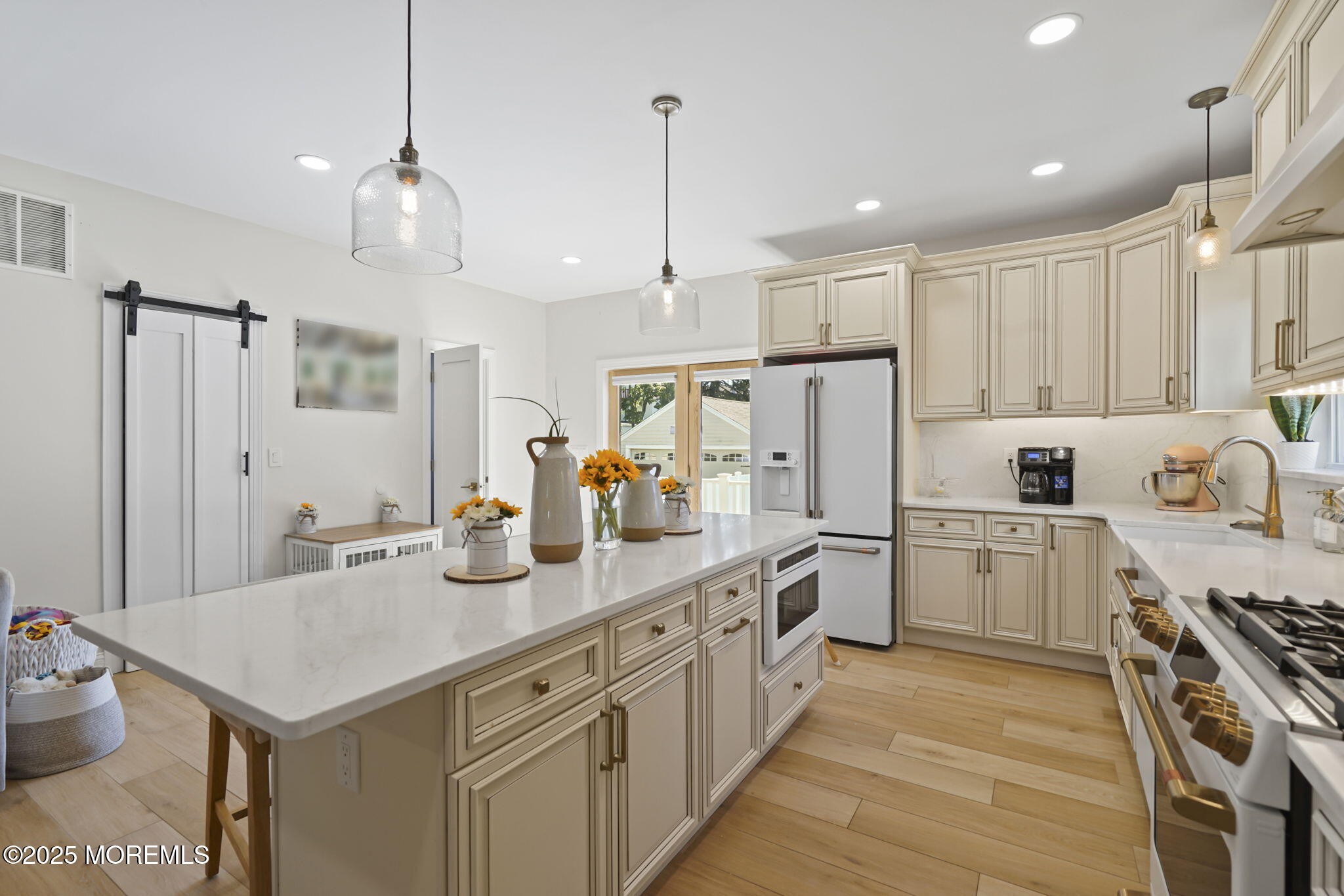 128 1st Street Keyport, NJ 07735 - Photo 5 of 38 a kitchen with white cabinets and white appliances