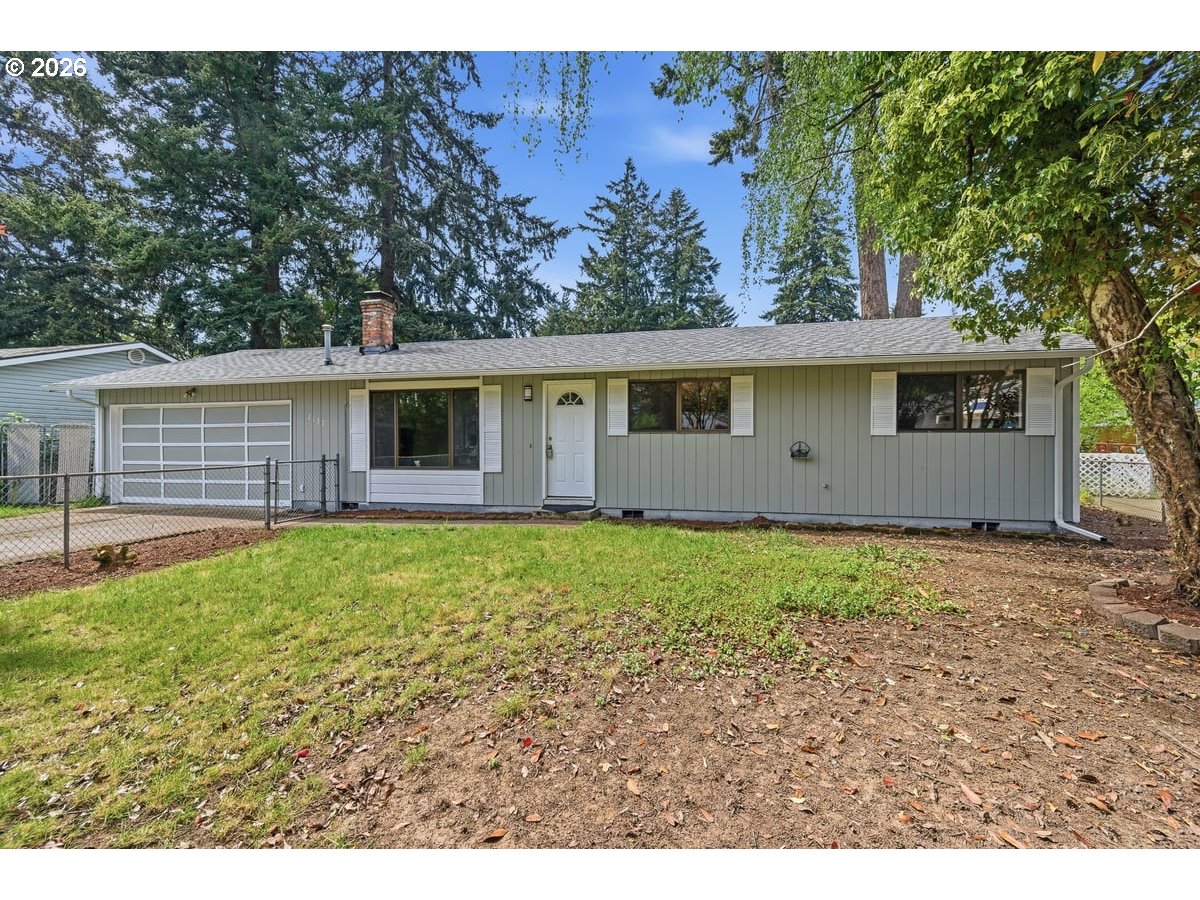 2137 Southeast 130th Avenue Portland, OR 97233 - Photo 1 of 14 a backyard of a house with lots of green space