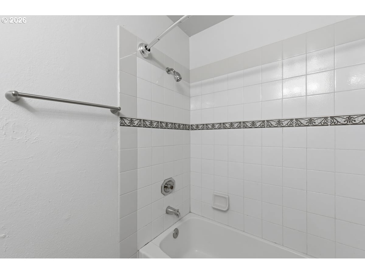 2137 Southeast 130th Avenue Portland, OR 97233 - Photo 12 of 14 a bathroom with a shower and a shower